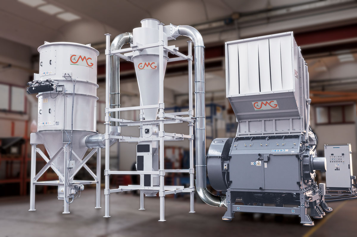The picture shows one of CMG's EV916 granulator with regrind evac system for shredding plastic
