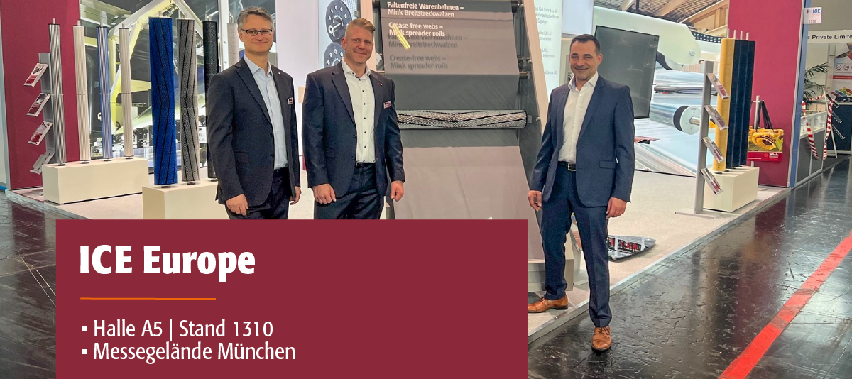 Auf dem Bild sieht man 3 Herren von Mink auf einem Messestand